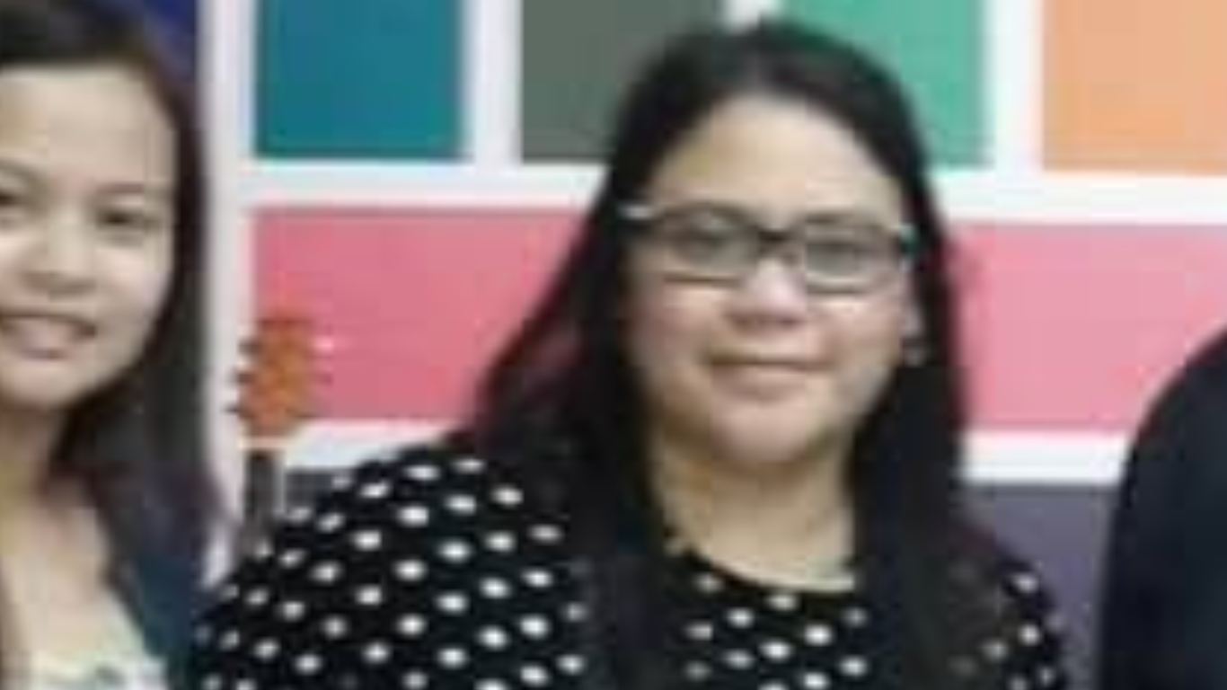 a lady with an eye glass